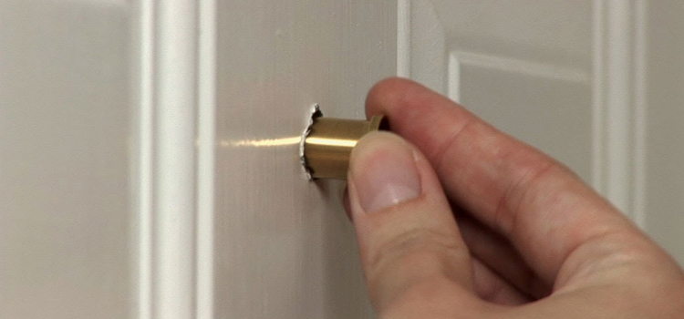 peephole door repair in Opa-locka